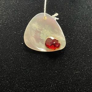 Mother of pearl guitar pic with Crystal skull has hole for bracelet/necklace etc